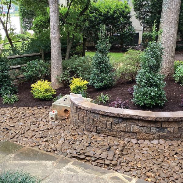 Side Yard Landscaping with Rock Wall